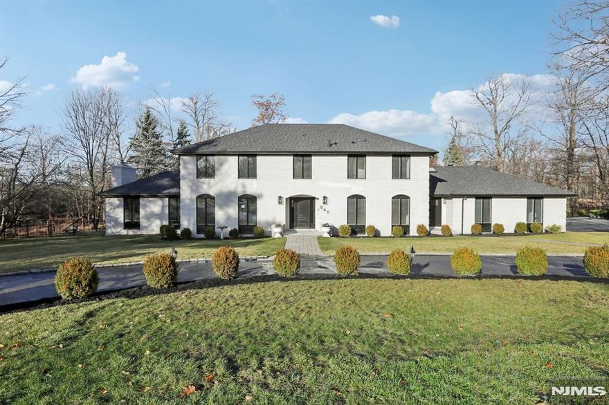 This stunning, newly renovated home spans approximately 6000 sq ft, offering a perfect blend of modern luxury. It is extremely inviting, as guests are welcomed into a kitchen that seamlessly opens into a cozy family room. Perfect for Summer gatherings, the expansive backyard has a gunite pool with new pavers. Situated on 1.5 acres, this home is surrounded by trees and woodlands that create unparalleled privacy. Additional highlights include a formal dining room, a living room, a large mudroom/laundry area, and an attached 3-car garage. The second floor offers a primary suite with a walk-in closet, three additional bedrooms, a home office, and a hall bath. The fully finished basement walkout features approximately 2000 sq ft of versatile space and ample storage. Recently renovated in 2024, this welcoming home also has a brand-new septic system. Hot Tub as is. Don't miss the opportunity to own this exquisite property!