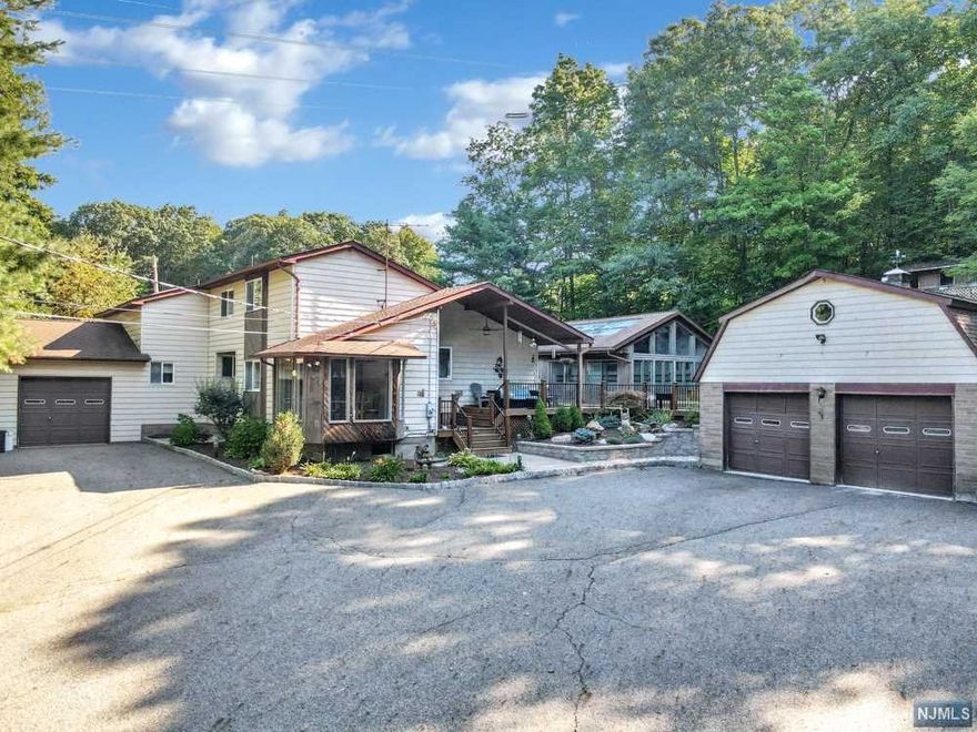 Amazing Custom Home Offered for The First Time. This Home Has it All. Amazing Detail With Indoor In-ground Pool, Open Floor Plan, First Floor Master Suite! Full Finished Walkout Basement! Detached Garage With Carport! Extremely Private off of Street! Private Pond, Large Entertaining Decks! Woodburning Stove, Generous Sized Bedrooms, Lots of Windows! This Home is Looking for It's Next Chapter. Needs alittle Updating to Make it A Diamond!