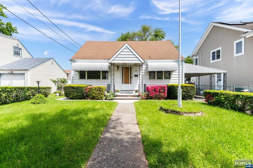 Move right in! Charming 3 bedroom, 1.5 bath meticulously kept Cape on quiet street in desirable location near major highways and parks. The first floor offers comfort through two split AC/heater units. Enjoy your yard while lounging or entertaining on your covered patio. Best of all, be sheltered from rain and snow when you enter and exit your home through the sunroom to the attached carport. The possibilities are endless for the large basement, which features a half bath and dry bar. The third bedroom is adjacent to a space that could be a sitting room, office, dressing room, or whatever meets your needs. This home is not to be missed!