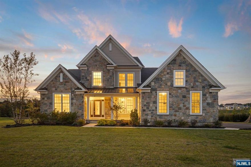 Experience the ultimate in luxury living w this stunning estate situated on a sizable 1.58-acre lot in prestigious USR, the sole property available in the exclusive Toll Brothers Orchard Ridge. This home masterfully combines elegance & comfort to create an exceptional living environment in a peaceful setting. Upon entering the grand 2-story foyer, highlighted by a striking staircase, you'll feel the modern charm that defines this residence. The gourmet kitchen is a chef's dream, complete w Sub-Zero & Wolf appliances, a center island & cozy breakfast area w skylights, all flowing seamlessly into the open living areas. The 2-story great room, feat. a gas fireplace, offers a serene ambiance. The first flr primary suite adds convenience with elegance. The 2nd floor offers 3 additional bedrooms w a full bath. Finished bsment offers endless opportunity. Enjoy a relaxed atmosphere in a prime loc. w exceptional schools, convenient shopping & access to highways -the perfect luxury retreat