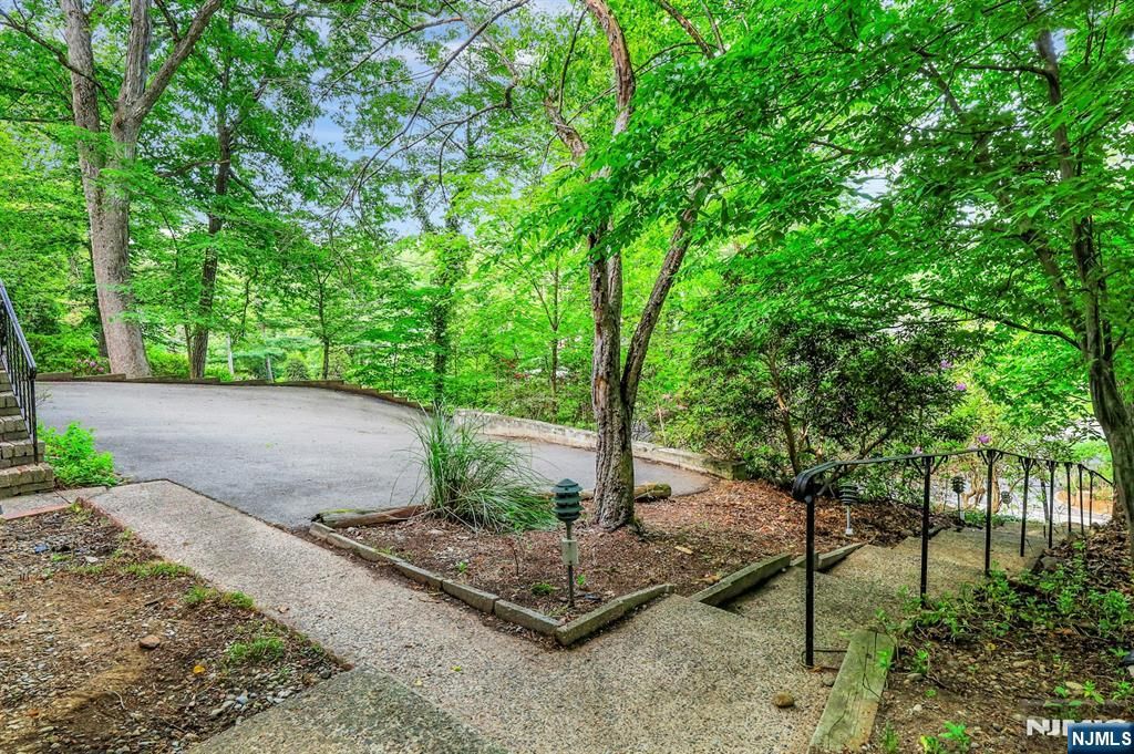 Photo of 297 E Pines Lake Drive, Wayne, NJ 07470 (MLS # 26016966)