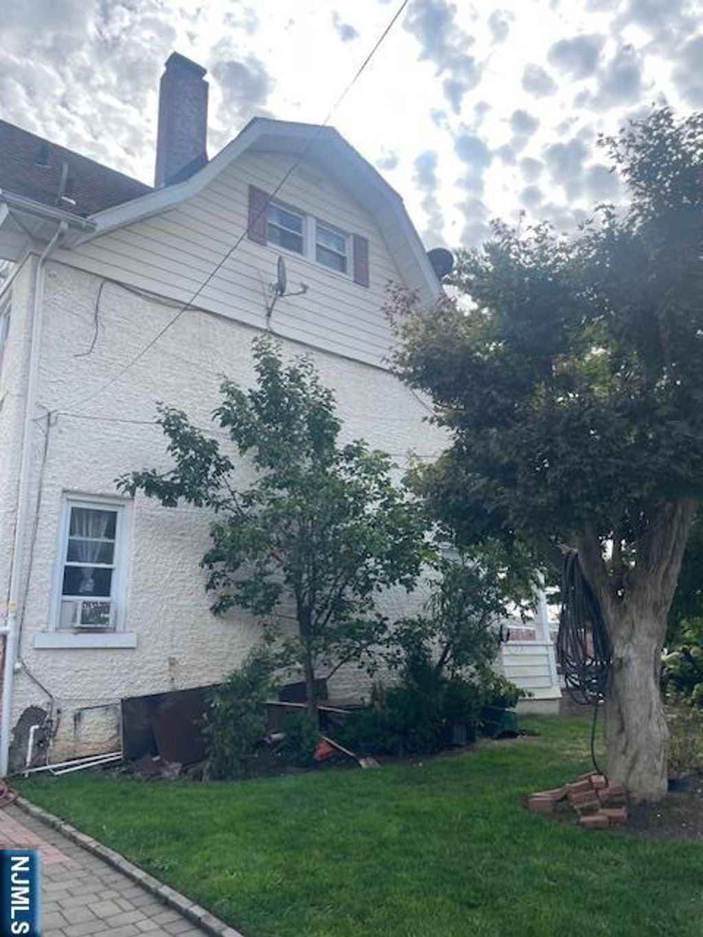 Photo of 90 Dewitt Place, Hackensack, NJ 07601 (MLS # 25035378)