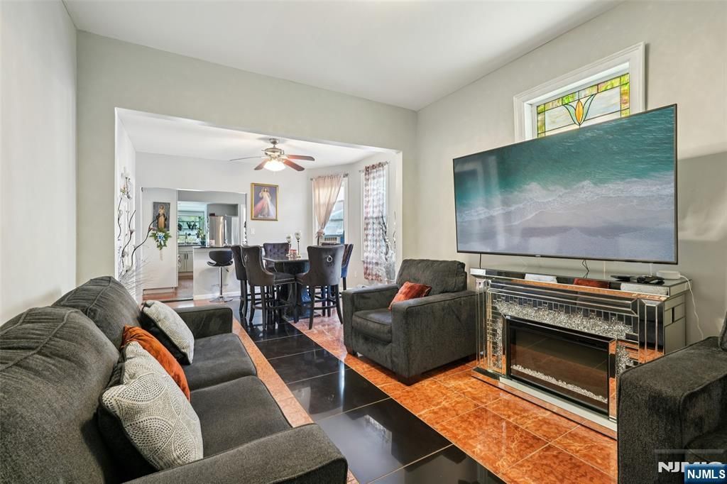 Photo of 55 Hobart Place, Garfield, NJ 07026 (MLS # 25040880)