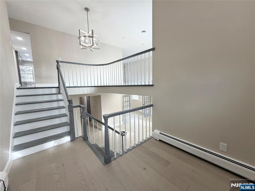 3300 sqft of elegant finishes in terms of high-quality materials and craftsmanship with 5 bedrooms and 3 bathrooms. Mirage Aspen hardwood floors; Fabuwood Onyx wood kitchen cabinets; Thor Kitchen appliances, headlined by 36" Gordon Ramsey chef edition gas range; Cambria countertop in kitchen and bathrooms; Bestar closet systems are just a few of the quality materials used throughout. Laundry also doubles as a summer kitchen. Additional features include: Elevator, back-up generator, central heating & cooling, central vacuum, wood fireplace, 3-car garage. Fenced-in backyard. Huge/modern kitchen; luxurious master suite with spacious master bathroom and walk-in closet. Listing Agent is partial owner of the property.