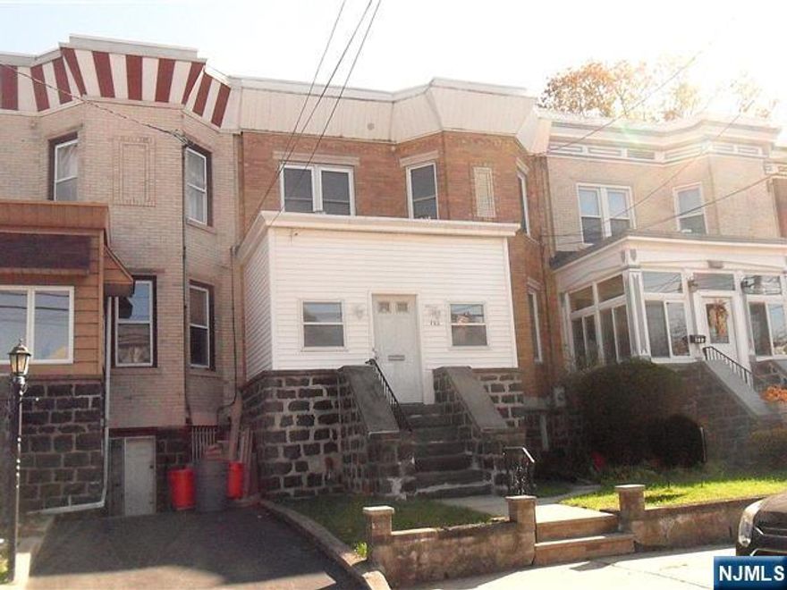 All brick townhouse located in best neighborhood. Featuring 3 bedrooms, modern eat in kitchen, oak flooring, CAC, deck off kitchen, rear yard, finish basement with family room, full bath and laundry room OWNER MOTIVATED!!