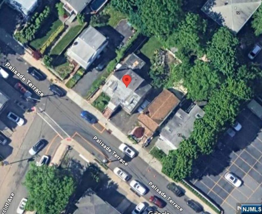 Incredible Opportunity in Prime Edgewater Location! Nestled on one of Edgewaterâ€™s most desirable streets, this property presents outstanding potential for builders, investors, or future homeowners ready to create their dream residence. Situated on a generous lot, the existing home features 3 bedrooms, 2 full bathrooms, and a half bath. The second floor was previously used as a separate apartment and includes its own kitchen, offering flexible layout options. The property also includes a driveway, a spacious two-car garage, plus an additional garage located underneath the house, providing ample parking and storage. A brand-new oil heating system has been installed, and window units are in place for cooling. While the current structure stands, the true value lies in the land and its unbeatable location. Ideally suited for new construction, this is your chance to design a custom home in a highly sought-after neighborhood, just minutes from the waterfront, NYC transportation, shopping, and dining. Whether you're envisioning your forever home or a new development project, this property is full of possibilities.