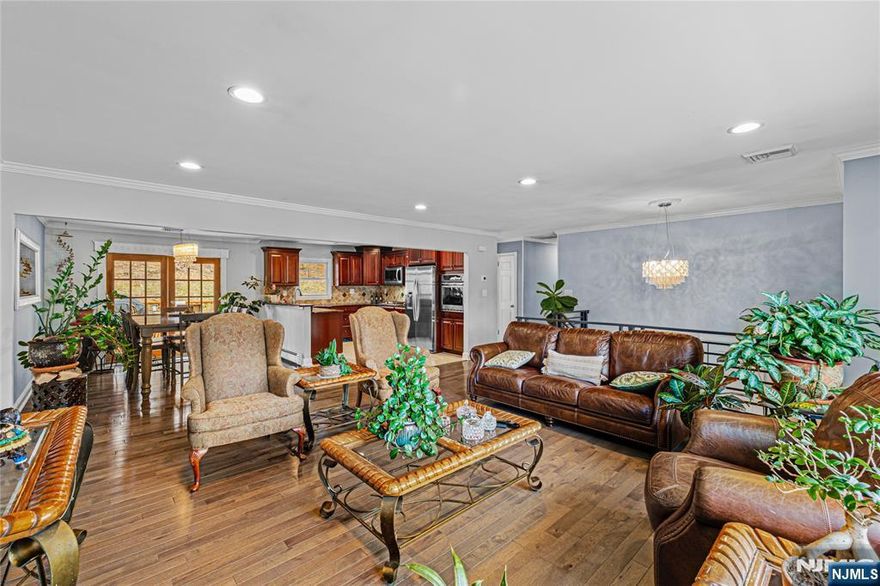 Welcome to this beautifully maintained raised ranch-style home in the heart of Kenvil, NJ! This charming residence features Four spacious bedrooms and Three Full baths, perfect for comfortable living. Step outside to enjoy your private deck and backyard, ideal for outdoor gatherings or peaceful relaxation. The laundry room, living room, and dining room offer convenience and functionality for everyday life. You'll appreciate the full finished basement for additional living space and storage. With central air conditioning on main floor, your comfort is guaranteed year-round. The kitchen is equipped with stainless steel appliances, including a refrigerator, gas range, microwave, and dishwasher, making meal prep a delight. This property also includes car garage and driveway, making parking a breeze. Conveniently located near schools, parks, transportation, shopping, and dining, this home is well-situated for a vibrant lifestyle. Don't miss out on the opportunity to make this wonderful house your new home! Act Quickly.....