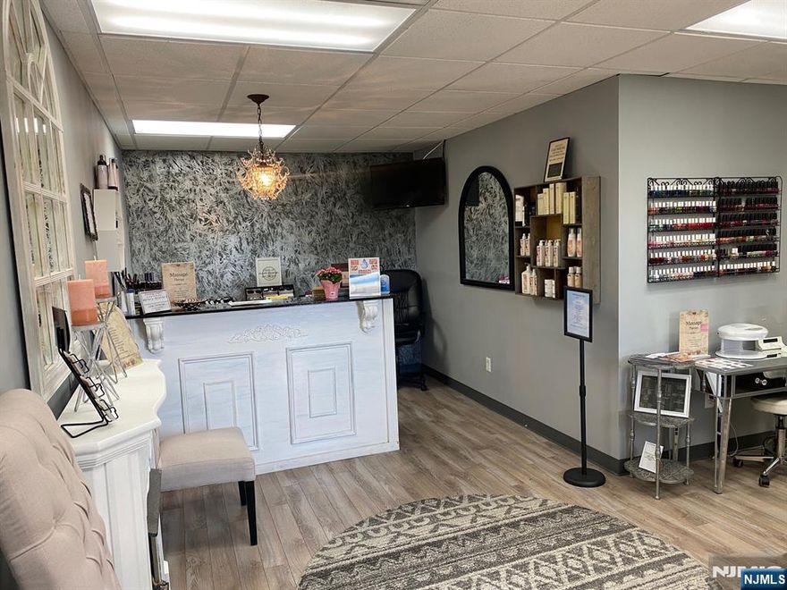 Discover an exceptional opportunity to own a thriving spa and salon located in the bustling heart of Norwood's central business district. This well-established facility offers a comprehensive array of services, including a hair salon, electrolysis, facials, massages, manicures, pedicures, threading & waxing catering to a diverse clientele in a high-traffic area. Spanning approximately 1,100 square feet, according to NJMLS tax records, this spa provides a welcoming and serene environment for relaxation and rejuvenation. The property benefits from a landlord who covers snow removal, taxes, and common area maintenance, ensuring a hassle-free ownership experience. With a competitive monthly rent of $1,575, the landlord is open to negotiating a new lease for the incoming tenant, providing flexibility and security for your investment. The dedicated and experienced team of employees is committed to staying on, ensuring continuity and expertise in service delivery. Located in Norwood's vibrant commercial hub, the spa boasts ample parking & elevator access, making it convenient for clients and staff alike. This prime location offers excellent visibility and accessibility, attracting a steady flow of patrons seeking high-quality spa and salon services. Seize this unique chance to own a spa in a sought-after area, where you can build upon an established 21 year reputation and expand your business vision.