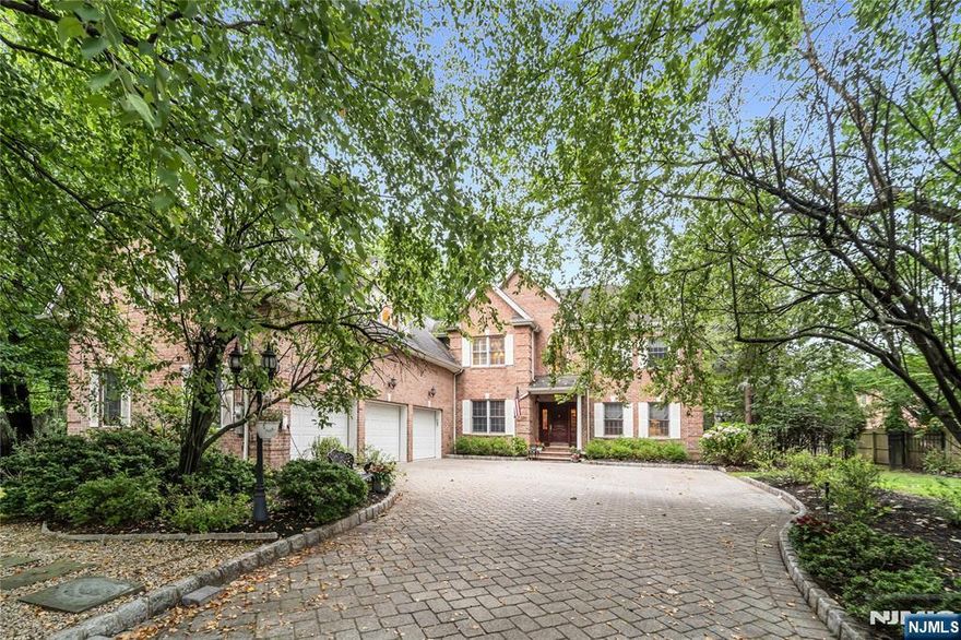 Discover this thoughtfully crafted two-story home in Norwood, set within a highly regarded Blue Ribbon school district. Built in 2004, the main level showcases an airy open layout with soaring ceilings, a spacious family room with a gas fireplace, and sliding glass doors that open to a paved patioâ€”ideal for seamless indoor-outdoor living. The bright eat-in kitchen features a center island and flows effortlessly into the living space. This level also includes a private home office, powder room, full bath, a versatile bedroom with hardwood floors, and a convenient laundry room.