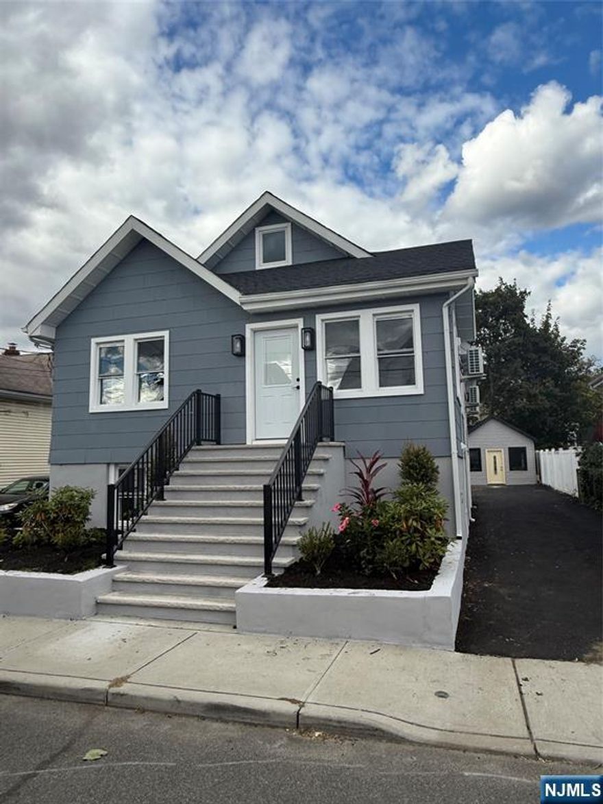 Welcome to this beautiful totally renovated home located in the heart of Little Ferry! This move-in ready single-family residence offers modern updates, excellent curb appeal, and a spacious layout perfect for comfortable living and entertaining. The first floor features 2 bedrooms, a full bathroom, a cozy den, and a bright living room. The large eat-in kitchen is a chefâ€™s delight with quartz countertops, stainless steel appliances, and plenty of cabinet space. The second floor offers a large versatile room that can be used as an additional bedroom, home office, or recreational space â€” the choice is yours. The finished basement includes two additional rooms with insulated walls and heating, a full bathroom, and a laundry area with a sink. Thereâ€™s also a convenient side entrance for easy access. This home has been completely renovated inside and out, featuring all new floors, walls, moldings, and doors, as well as a new roof and all new windows. Enjoy the outdoors with a large deck and backyard, storage shed, and a long driveway providing ample parking. Conveniently located close to shopping, schools, parks, and transportation, this home truly has it all â€” style, space, and a prime location. Donâ€™t miss the opportunity to make this beautifully renovated home yours!