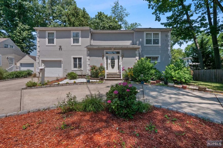 WELCOME TO THIS GRANDIOSE HOME ON A QUIET, DEAD END STREET! THIS HOME OFFERS OVER 2700 SQFT OF LIVING SPACE, CENTRAL AIR, AND FORCED HOT AIR. BE WELCOMED BY A CIRCULAR DRIVEWAY AND ENTER THROUGH THE FIRST FLOOR TO A LARGE LIVING ROOM, 2 BEDROOMS, A KITCHEN WITH A BREAKFAST NOOK, DINING ROOM, AND OFFICE. THE SECOND FLOOR OFFERS A LARGE MASTER BEDROOM SUITE, 2 BEDROOMS, FULL BATH, AND BALCONY. HUGE BAKYARD WITH THE POTENTIAL TO ADD A DECK OR POOL. THIS HOME IS NEAR PUBLIC TRANSPORTAION AND THE GEORGE WASHINGTON BRIDGE!