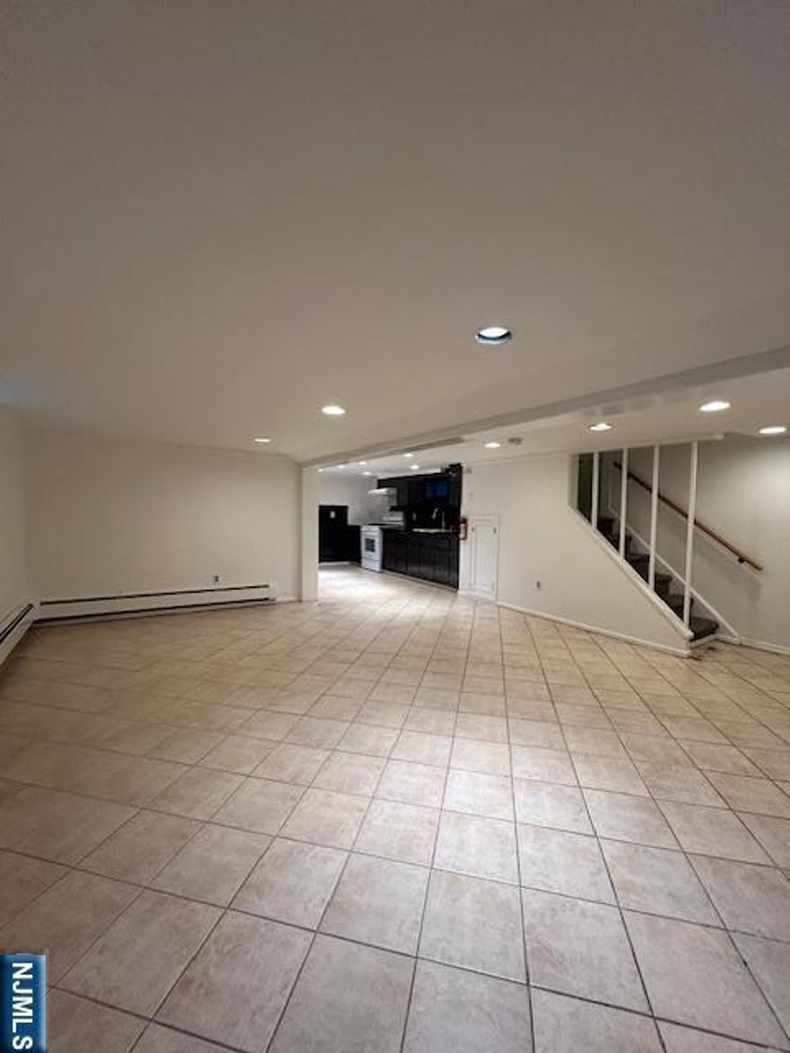 Nice Size 1 Bedroom; Large Living Room/Dining Area Combo; Full Kitchen, 1 Bathroom; Recessed Lighting Throughout; Separate Entrance; Updated Appliances; Heat, Hot & Cold Water, Electricity all Included in Rent; Cats ok; Note :: Ceiling Ht 7Ft; 1 Block away from public transportation; landlord is licensed new jersey agent