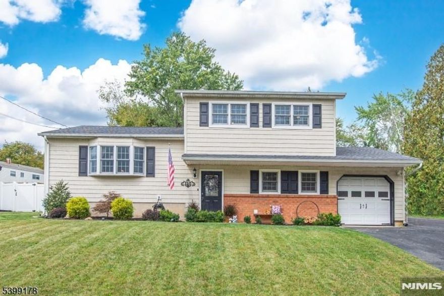 Absolutely Stunning & Fully Updated Split-Level in One of the Area's Most Sought-After Neighborhoods! Prepare to be impressed by this meticulously maintained 3-bedroom, 2 full bath split-level home offering exceptional updates, outstanding flow, & true move-in-ready appeal. From the moment you enter, you'll appreciate the warmth of the gorgeous hardwood floors, thoughtfully designed layout & seamless connection between living spaces. The heart of the home is the expansive, beautifully updated eat-in kitchen, featuring high-end cabinetry, premium appliances, generous counter space-perfect for everyday living & entertaining. The laundry room offers the potential to be converted into a 4th bedroom or office. The home's flowing floor plan provides comfortable separation of living, sleeping, and gathering areas while maintaining an open, inviting feel. The private backyard, ideal for entertaining, gardening or peaceful relaxation. Whether hosting friends or simply unwinding, this outdoor space offers the privacy & comfort you're looking for. Newer roof and AC & upgraded electric and plumbing, giving you peace of mind for years to come. The 1-car garage adds convenience, storage and additional functionality. Located in a highly desirable neighborhood known for its charm, community feel & well-kept homes, this property stands out with its beautiful decor, top-tier updates & meticulous care. Truly a must-see home that checks every box! Public water/sewer & natural gas. Just unpack!