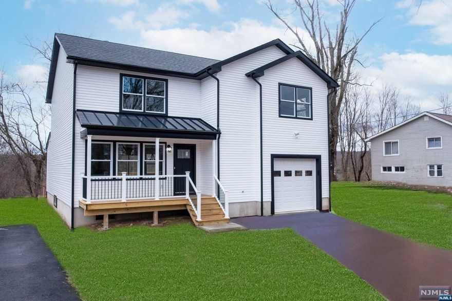 Brand New Construction! Custom Home! Open Floor Plan, Custom Woodwork & Trim Throughout. Spacious Main Bedroom Which Included 2 Walk In Closets, En Suite with Double Vanity & Tiled Shower. Additional Bedrooms Also Boast Large Walk In Closets and a Built in Desk for Office Space or Homework Station. Kitchen Includes Center Island, Granite Countertops, Stainless Steel Appliances and Pantry. Large Mudroom and Laundry Room. Fantastic Curb Appeal with Large Front Porch, Flat Yard, and New Matching Shed. Conveniently Located 1 Block from Greenwood Lake and NJ Transit Bus Stop/ Park & Ride! 1 Hour From NYC