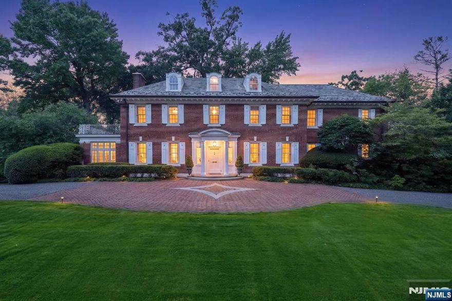 Experience unparalleled grandeur at 200 Lincoln Street a masterfully preserved and renovated historic estate situated on over an acre of lush park-like grounds in the heart of Englewood's prestigious East Hill. This is not just a residence, it is a private compound designed for the connoisseur of fine living. Modern living with the ultimate in outdoor entertainment the commanding presence of this seven bedroom home sets a tone of elegance that continues throughout the residence. Soaring ceilings and expansive windows flood the interior with natural light, highlighting the architectural details and grand scale rooms perfect for hosting gatherings. The heart of the home features a world-class Christopher Peacock kitchen seamlessly blending artisanal craftsmanship with professional grade performance. Your own private resort awaits centering around a sparkling swimming pool framed by mature trees and lush manicured park like grounds. Just 6 miles to NYC and minutes to downtown Englewood.