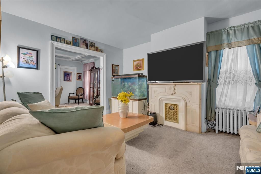 Photo of 128 Arlington Avenue, East Orange, NJ 07018 (MLS # 26007111)