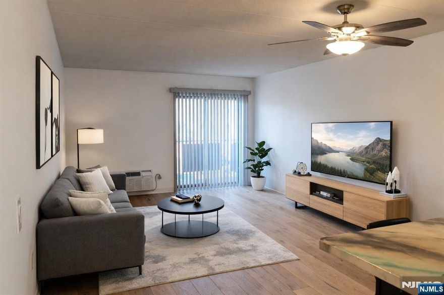 Updated and beautifully maintained 1-bedroom apartment in one of Hackensackâ€™s most desirable locations. This bright home features a large open-concept kitchen, brand-new in-unit washer and dryer, a spacious walk-in closet, and a private balconyâ€”perfect for relaxing. Enjoy the convenience of assigned parking space as well as ample visitor parking in a well-maintained building just steps from it all. Quick walk to NJ Transit trains and buses, with easy access to shopping, dining, and downtown Hackensack. Flexible option available: The unit may also be rented for $2,350 with one assigned outdoor parking space and one indoor garage parking space. Comfort, style, and unbeatable convenienceâ€”this one truly checks all the boxes! *Unit has been virtually staged*