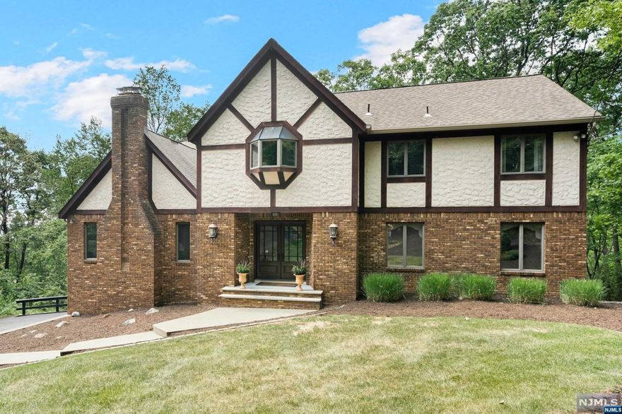 "Welcome Home". Don't miss this opportunity to own this wonderful Colonial home built on 8.43 acres backing up to state Land. This home is located on a quiet cul-de-sac street and is within minutes to major highways. Well loved and cared for, it offers over 3400+ sq ft of living space. Spacious rooms throughout, 29 X 20 great room with cathedral ceiling and wood burning fireplace open to large kitchen with glass doors out to new deck over looking private tranquil wooded property. Beautiful formal living rm and dining rm for entertaining, huge master suite with large master bath, walk-in closet, 2 additonal double closets and 3 addtional large bedooms on second level. Be sure not to miss future living space in walkout lower level. This home is truly a fined, don't wait, schedule your appointment today!!