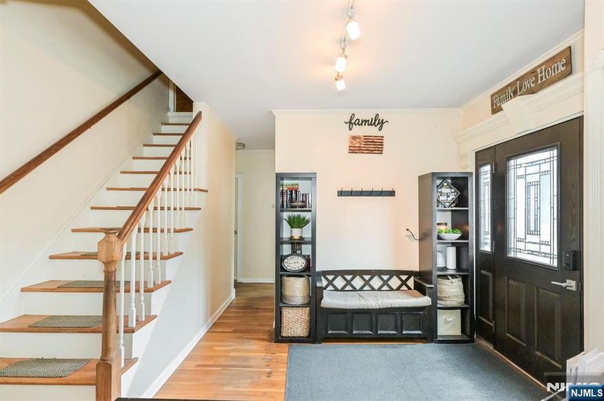 Welcome home! This maintained, five bedroom, three full-bathroom home is currently used as a single family and zoned multi-family. The second floor unit is accessible through both the interior and a separate rear entrance. The first floor's open concept lends great to entertaining, especially in the oversized kitchen. The finished basement with direct access through the garage has a separate entrance that could be reopened. There's a bedroom, bonus room, and newly renovated bathroom (with heated flooring!) that would be perfect as an in-law suite. Plus! A full pantry, laundry room, and utility space with additional storage. HVAC and condenser are recently upgraded, as is the roof within the last two years. The home is perfect for first-floor living with the apartment upstairs as additional tenant income!