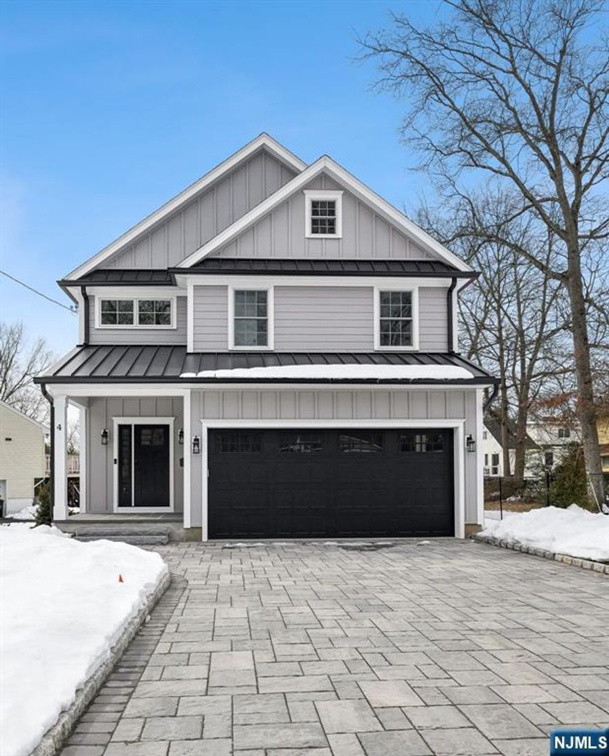 This stunning newly constructed home (with builders' 10 year warranty boasts meticulous attention to detail throughout. 6 Spacious Bedrooms, 5 full & 1 half Baths. First floor boasts open concept Living/Dining Room with gas fireplace & sliding doors to huge deck with gas hook-ups for outdoor entertaining. 2-zone heating & cooling. Beautifully appointed Kitchen with all stainless steel appliances including wine refrigerator, granite countertops, spacious center inland & detailed lighted cabinets. First floor guest Bedroom or Office including full Bath, Mudroom, & Powder Room complete this level. 2nd floor offers 4 luxurious Bedrooms & 3 full Baths plus Laundry Room. Primary Bedroom with vaulted ceiling; ceiling fan & stunning backsplash; fully appointed walk-in closet. Primary Bath has heated flooring & dual sinks. Lower level provides versatile living with access to the backyard. Bedroom with full Bath plus storage area. This home truly maximizes comfort & functionality. Extras include: underground irrigation system, electric charging station conveniently located in the spacious 2-car garage, gutter guards, paver driveway with parking for 4 cars. Newly landscaped on deep lot. Taxes to be assessed. Some photos noted have been virtually staged.