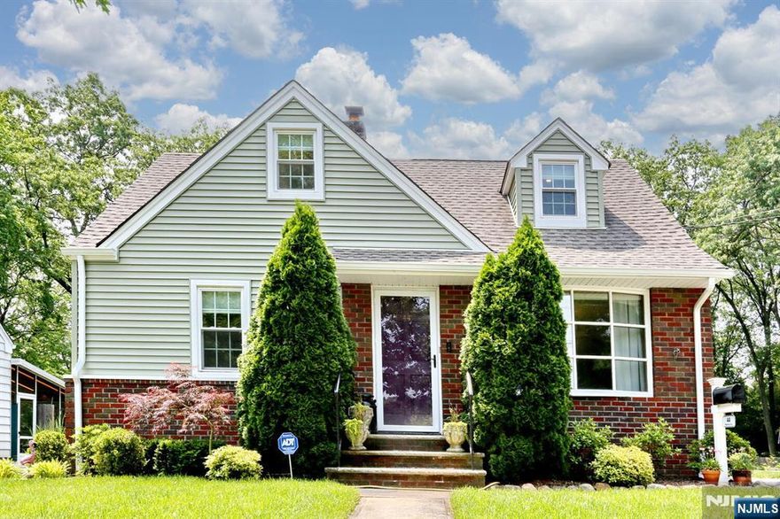 Location, Location! Enticing the buyer with an Expanded & Renovated 4BR, 2 FBTH Colonial Cape with a 2 Car Garage. Situated in the town of Hawthorne in Passaic County, the convenience of NYC Rail & Bus Commutation from Glen Rock Train Station in Bergen County is a Dream Come True! ! The open concept dining area allows for flexible furniture arrangement and seamless flow between the kitchen, dining spaces and family room.. Custom Closets in all the Bedrooms, adds to the Ample Storage this home offers. Central Air, Hardwood Floors,, a Renovated First Floor Full Bath and a New Second Floor FBSS adds to the Value and Comfort of this Beautiful Home. Come While Away the Seasons in the Expansive Fenced in Backyard that is perfect for recreation, relaxation, entertainment, and enjoying the natural surroundings and making new memories!