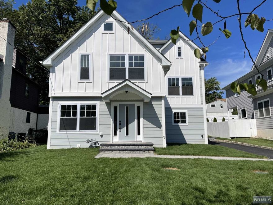 Stunning custom built 5BR/4.5BA colonial with 4000+sq ft of living space in the best location of the best town! This home boasts spacious open floor plan,1st floor Livingroom, family room and formal dining room, The kitchen is complete w high-end SS appliances, center island ,quartz counters, custom cabinets. The 2nd floor is home to 4 bedrooms, luxurious master suite , laundry . The 3rd floor has own suite with a living room. Fully finished basement ,Media room, Rec room and Full bath. All build in closets .Walking distance to schools and train station to NY CITY! Must see!!!