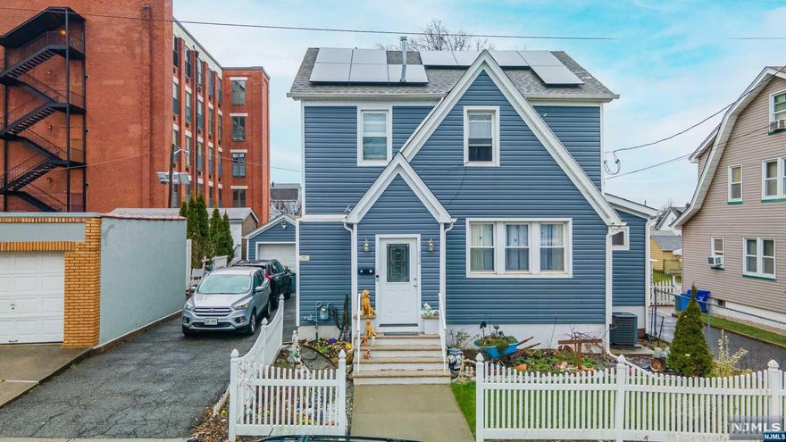 Experience the perfect blend of modern amenities and meticulous maintenance in this beautifully renovated home. Updated five years ago, this residence boasts comprehensive improvements including a new roof, plumbing, electrical systems, and dual HVAC units, ensuring comfort and efficiency. Inside, you'll find an exquisite open-concept layout bathed in natural light, highlighting the stunning hardwood floors that stretch throughout the home. The kitchen dazzles with its sleek quartz countertops and stainless-steel appliances. Step outside to discover the spacious deck, an ideal oasis for relaxation or hosting memorable gatherings. This home is a testament to careful upkeep and sophisticated living.