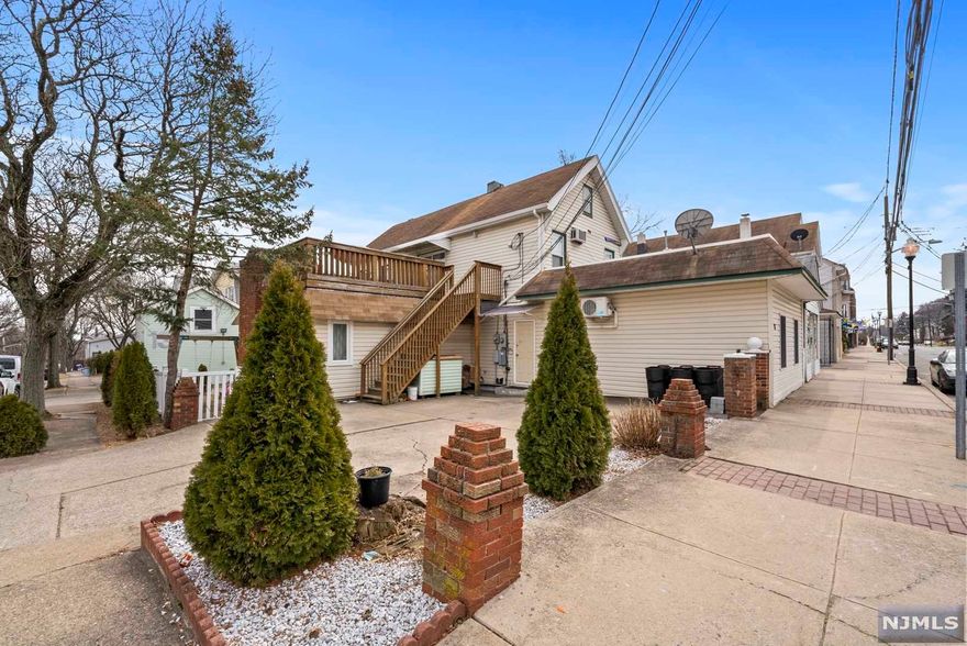 WELCOME HOME! THIS INCREDIBLE TWO FAMILY HOME BOASTS 10 RMS, 5 BDRMS, & 3 FULL BTHS. THE 1ST UNIT IS COMPLETELY RENOVATED & BOASTS A LIV RM, EAT-IN-KITCHEN, 2 BDRMS, COMMUNITY BTH & A LARGE MSTR BDRM W/ MSTR BTH & WALK IN CLOSET. THE 2ND UNIT BOASTS 2 BDRMS, 1 FULL BTH, LIV RM & A KIT. ADDITIONAL FEATURES: EXPANSIVE DECK, SEP UTILITIES & PLENTLY OF PARKING.