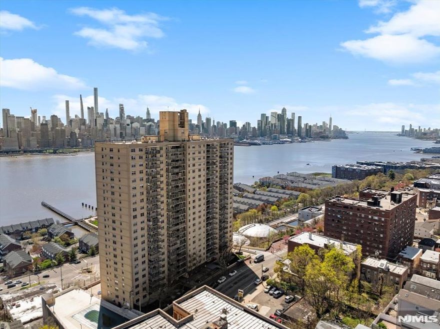 Welcome home to a completely updated 2BR corner unit with skyline views from your bedroom window, a private terrace to watch the sunset and tons of closet space! Unit 10E was designed for both comfort & style, with an open-concept living area, modern finishes including custom closet space and beautifully updated bathroom and kitchen. The spacious primary bedroom is a true retreat, featuring a walk-in closet and million-dollar skyline viewsâ€”the perfect backdrop for both sunrise and sunset. BR#2 is equally impressive, offering generous space for guests or home office. Come enjoy the perfect blend of luxury and convenience at The Versailles, a pet-friendly, luxury high-rise located on the vibrant Hudson riverfront offering residents 24/7 doorman, onsite laundry, heated pool, sprawling promenade, plus a variety of nearby restaurants, parks, shopping and scenic parks. NYC Bus & Ferry Shuttle Service right at your doorstep!