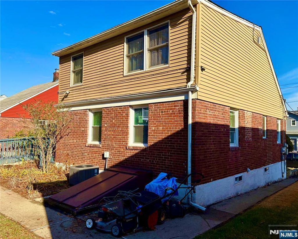 Photo of 48 Sussex Road, Bergenfield, NJ 07621 (MLS # 25042585)