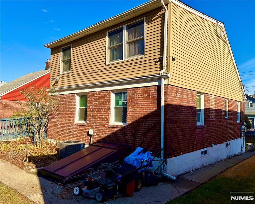 Photo of 48 Sussex Road, Bergenfield, NJ 07621 (MLS # 25042585)