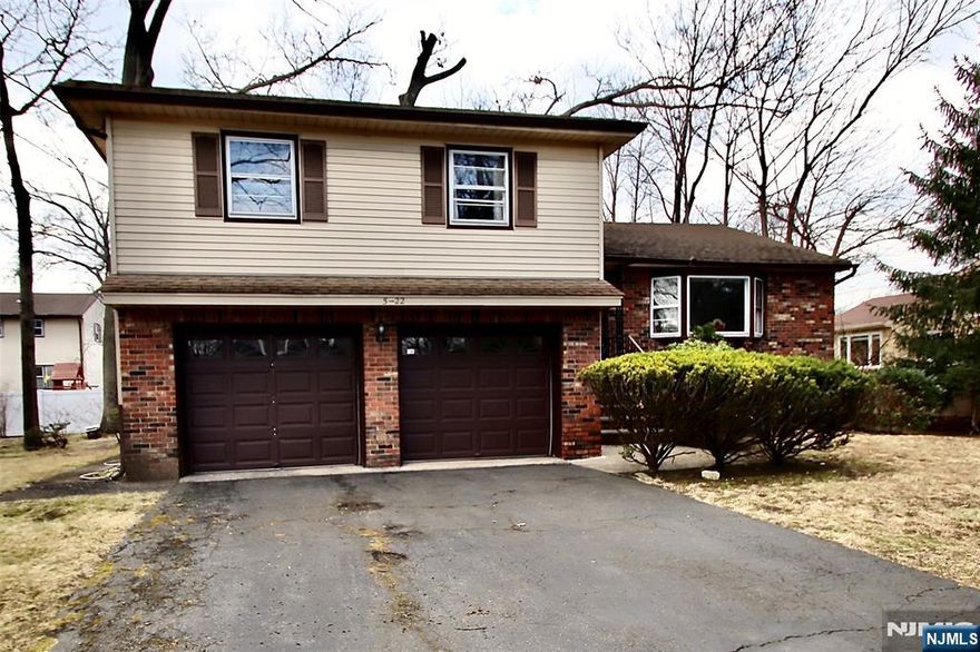 Located in highly sought-after Milnes area, this spacious 3 Bedroom 2 and 1/2 Bath Split Level is ready for a new chapter and so close to schools, NY Trans, Houses of Worship, Bike Path and shopping. 1st Floor offers Entrance Foyer with guest closet, Living Rm w/ vaulted Ceiling and Bay Window, Formal Dining Rm with Sliding Glass Door to Deck, and large Eat-in-Kitchen. Upstairs you will find 3 generously sized Bedrooms, including Primary Bedroom with its own Bath, along with Main Bath. Lower Level Family Room has closet, 1/2 Bath, Lg Pic Window, Entrance to Yard and Ent to 2-car Garage. Partially Finished Basement is ideal for additional living space plus separate work Rm, separate Storage Rm, and Separate Utility and Laundry Rm. 2 Zone newer A/C - With solid construction and well-designed layout, this home is ready for your updates and personal touches offering the perfect opportunity to customize and add value. Enjoy all the amenities Fair Lawn has to offer - town pool, dog park, plenty of parks, activities for all ages, Community Center with walking track & gym, Senior Center, Sports galore - Too many amenities to list - Hurry and make this home yours - Fair Lawn is a great place to raise a family