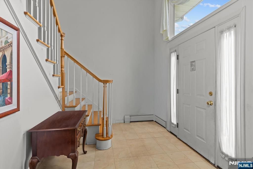 Photo of 215 Elsmere Place, Fort Lee, NJ 07024 (MLS # 25035782)