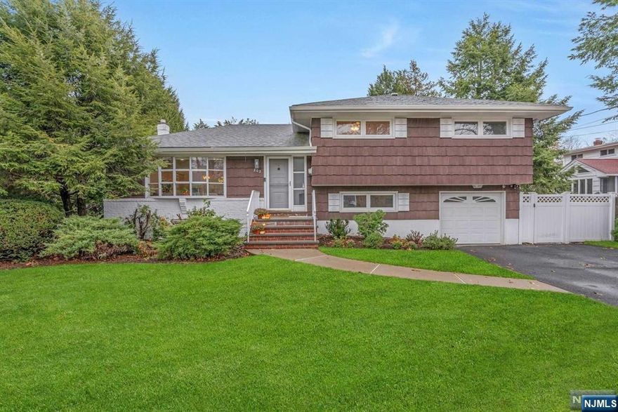 Move right into this updated and well maintained 3 bedroom, 2.5 bathroom split level located in the highly desirable town of Oradell. Beautiful open kitchen leads to dining room and large living room. Master bedroom with master bathroom, 2 additional bedrooms and full bath on top floor. Ground floor area leads to entry for 1 car garage, backyard, family room and powder room. Full finished basement with laundry and utility room. Central A/C and 2 zone heating. Wide driveway can accommodate multiple cars. Expansive flat backyard is perfect for all outdoor occasions. No pets.