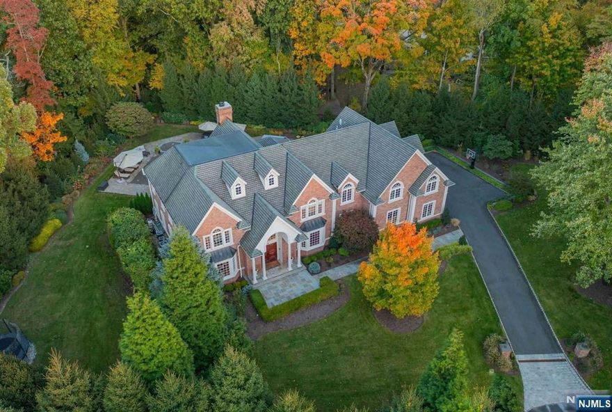 Welcome to one of a kind luxury! This grand estate is situated on a private cul-de-sac in the coveted east hill. Exquisitely renovated brick manor is the epitome of modern living. A bright 2 story entry w/sweeping staircase & fabulous floor plan. Offers an oversized LR & DR, dream kitch is high-end w/ top of the line applnc, seated quartzite isl,& brkfast rm. 2 stry great rm w/fl to ceilg FP & views of a private oasis. Custom billiard rm/library, 1st fl ensuite/office w/full bath, & an indoor cabana that services the outdoors. Mud rm w/access to 3 car heated grg. The oversized prim suite is one of a kind w/private sting rm, 2 cstm boutique closets, & a new spa-like bth w/cstm vanity, shower & soaking tub. The addt'l 3 enst br's are generous size. The outdoors is spectacular & private, w/a gunite pool, spa, FP & outdoor ktchn. The lower lVl is a haven, features a media rm w/bar, hockey rink, dance studio, gym , rec area. Smart home, generator, too many amenities to list!