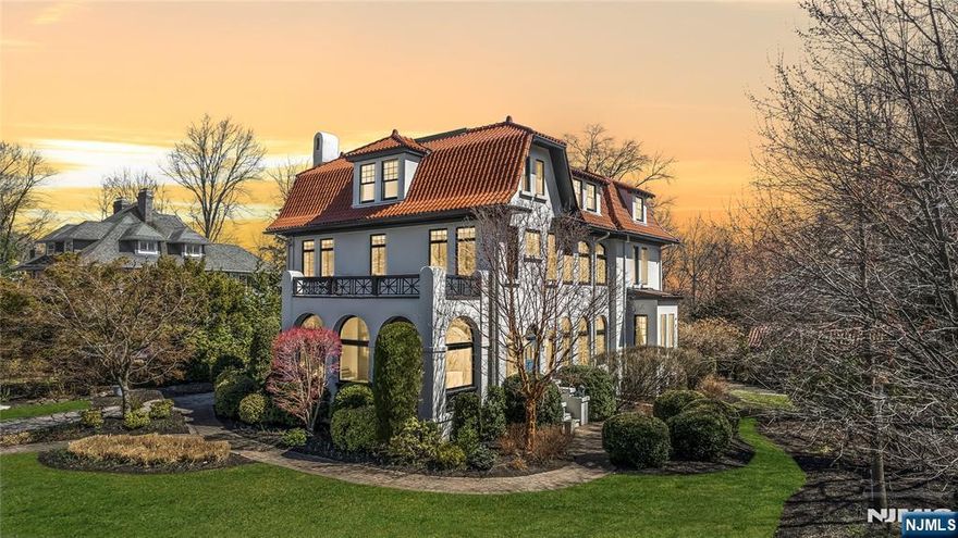 Your search for the perfect Montclair home ends here! This Mediterranean-style property, set on nearly an acre in the heart of Montclair, offers modern amenities with elegant historic charm. With space for entertaining, generous bedrooms, home offices, guest suites, and storage, the home blends contemporary living with sophistication. Soaring ceilings, arched windows, inlaid hardwood floors, and stunning stained glass are just a few of its exquisite details. Additional highlights include 2-zone central air, a finished basement, 2-car garage, underground sprinklers, and winter NYC skyline views. Relish the luxury of a landscaped yard (with space for a pool) or enjoy the prime location, just a short walk to Walnut Street and Watchung trains, shopping, and dining. Move in and experience the best of both worlds. This is a once-in-a-lifetime opportunity!