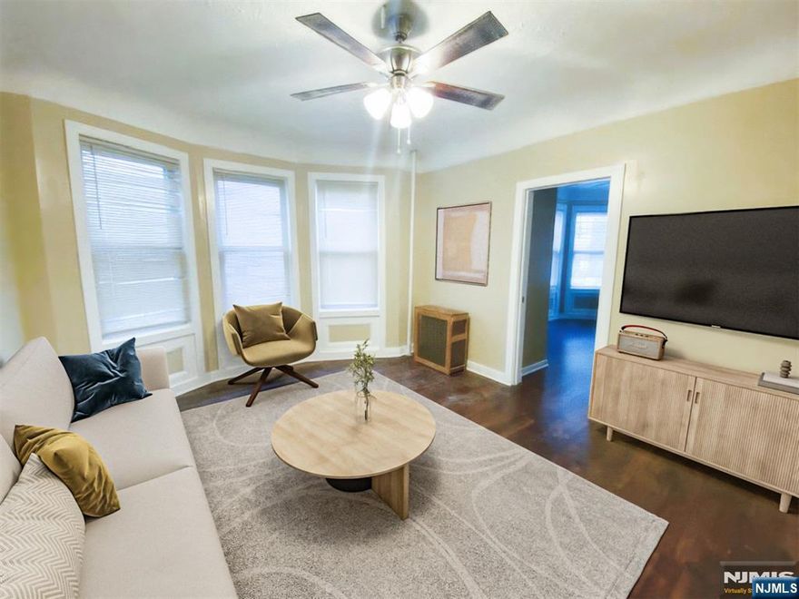 There's something truly special about this well-maintained home. The exterior boasts great curb appeal, with a recently paved driveway offering parking for at least five vehicles - maybe ten. Inside, the first floor has been beautifully renovated, featuring a spacious eat-in kitchen complete with stainless steel appliances, granite countertops, and elegant cherry wood cabinets. The living room has been updated with luxury vinyl flooring, combining style with durability. The second floor offers two bedrooms and one full bathroom, providing a comfortable and functional living space. The top floor serves as a bonus separate unit, featuring one bedroom, a full bathroom, a living room, and a kitchen perfect for rental income. All units have separate utilities, adding convenience and value. The first and second floors can be delivered vacant, offering immediate occupancy or leasing potential. Whether you're looking to live in one unit while renting the others, or seeking a turnkey investment property, this home checks all the boxes. Transportation is readily available, and you're just minutes from the Garden State Parkway. Home is being sold AS IS a fantastic opportunity for savvy buyers. Don't miss out this property deserves a spot at the top of your list!