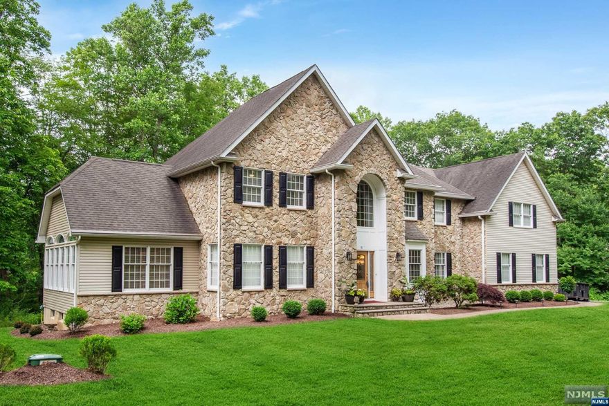 Welcome home to this fabulous 11-room colonial featuring 4 bedrooms and 3.5 bathrooms on 3.4 acres! Situated in a culdesac neighborhood with top-rated schools! Has 2-story foyer and formal living room and dining room with tray ceiling, conservatory with palladium top windows, office, 2-story family room with a stone high-efficiency fireplace, kitchen with center island and stainless steel appliances, powder room, and large mudroom off 3-car garage. Primary suite with huge custom walk-in closets, soaking tub, and radiant heat flooring in bathroom. A second suite plus two additional bedrooms are located on this level. Large unfinished basement, perfect for storage! Whole house generator, a brand new air conditioning unit, full house vacuum, water softener, underground sprinklers, and a smart thermostat! Comes with a full house warranty!