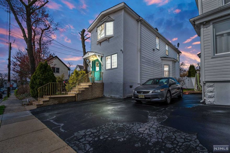 Welcome to this gorgeous 1 family home located in one of the best areas of Ridgefield Park. This lovely home sits on an oversized lot with outside parking for 3+ cars along. This gem has a total of 3 bedrooms along with 2 full baths. There's also an unfinished basement with a ton of storage, laundry machines, and an extra room for your family needs. The pristine kitchen has an array of stainless steel appliances. There's also a beautiful spacious backyard. The property is ideally located near all schools, shops, restaurants, and easy access to NYC. This is exactly the home you've been looking for. Schedule a tour today!