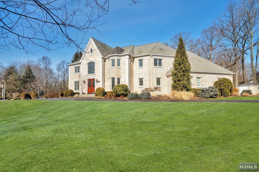 Location, location, location! Powerful and elegant Colonial located on a private cul-de-sac in one of Allendale's premiere neighborhoods just blocks from all 3 highly ranked schools; Hillside Elmtry, Brookside MS and Northern Highlands HS.Magnificent professional landscaping by Scenic Landscape, surround a natural form pool w/waterfall rock feature, new handsome outdoor fireplace w/wet laid brick & grand slate mantel. Serene & private setting on almost an acre, perfect for outdoor living. Approx.6500 sqft of thoughtful quality interior improvements & details since ownership including new master bath, stunning custom kitchen, w/TOL appliances, desk area, btlr pntry, and Custom Salerno bar in a full finished basement has resulted in sheer perfection! Elegant entry welcomes you to bright & spacious formal living & dining rms. Spectacular Fam rm w/soaring ceilings overlooking property. 1st flr bedrm, FullBth,lndry,mudrm &3Car Gar.2nd flr w/4 generous en-suite bdrms & WICs. A must see!