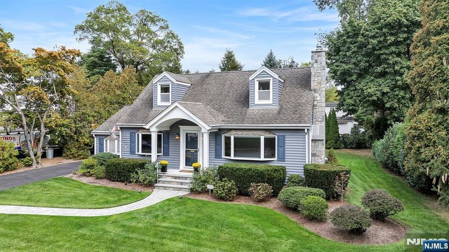 Welcome to this beautifully maintained 4-bedroom, 3-bath home perfectly situated on a meticulously landscaped property in a prime Ridgewood location, close to top-rated schools, parks, and the vibrant downtown area. Step inside to find a warm and inviting living room with a picture perfect bay window and gas fireplace, seamlessly flowing into the formal dining room-ideal for entertaining. The updated kitchen features stainless steel appliances, granite countertops, and a sunny breakfast area that opens to a bright den filled with natural light- perfect for everyday living or relaxing. The spacious first-floor primary suite offers a beautifully updated en-suite bath, while an additional bedroom (or home office) and updated full bath provide flexible living options. Upstairs, youâ€™ll find two additional bedrooms and a third full bath. The finished lower level includes a large playroom or media space, laundry and plenty of storage. Step outside to a large deck overlooking a private, flat play yard- perfect for outdoor dining, relaxing, or entertaining. A detached 2-car garage adds even more convenience to this exceptional property. Donâ€™t miss your chance to own this warm, welcoming, and move-in ready home!