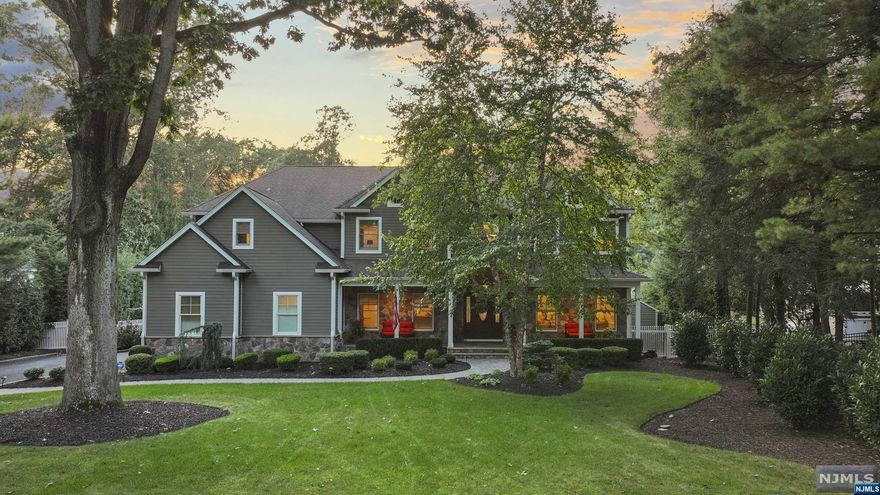 Welcome to the epitome of luxury living. This sprawling estate spans over 5,400 sq ft, boasting 5 bedrooms and 5 1/2 bathrooms. Every corner of this home exudes elegance with custom millwork throughout that showcases impeccable craftsmanship. You'll be greeted by a grand 2-story entry and a breathtaking great room with custom fireplace and beams. The open floor plan seamlessly connects the great room to the large kitchen, creating the perfect setting for entertaining guests. Highlighted by the heated covered patio, where you can unwind and entertain year-round, thanks to a cozy fireplace and a state-of-the-art TV. Indulge in the ultimate resort-like backyard, featuring a gunite pool, oversized hot tub, thrilling slide and tranquil waterfall, a true oasis for you and your loved ones. The primary suite is a haven of opulence, featuring a spacious layout with a balcony overlooking the breathtaking yard. Don't miss the opportunity to call this extravagant Wyckoff estate your own.