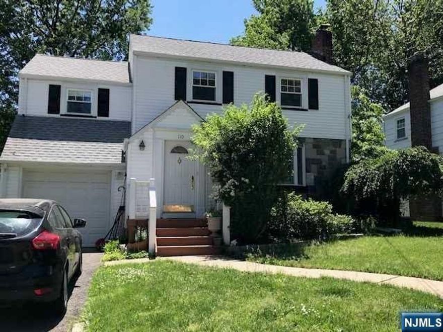 Great starter house! Beautifully maintained 3-bedroom home on quiet, tree-lined street. First floor has a large Living Room/fireplace, Formal Dining Room, office/den, kitchen, powder room. 3 bedrooms and full bath on the second level. Basement is partially finished with a full bath and the back property is deep and tranquil. Freshly painted interiors and deck, hardwood floors, central air, one car garage, walking distance to transportation and houses of worship.