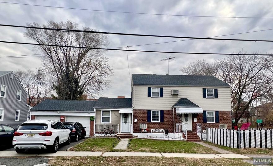 Amazing opportunity to own this gorgeous 2 Family home; amazing for owner occupied or investment. It includes a large 2 car garage and driveway space for sufficient parking. Individual entrances and yard space give you extra privacy in this perfect home. Basement includes a full bath, laundry and a bonus room and rec room that can be used as an expansion for the first unit. Lower Unit is 2 Br, Den, 1 bath and Open concept living room, large kitchen, and dining. Upper unit is updated 2 bedroom 1 bath and living area converted to bedroom, can be easily converted back and a laundry room. Located in the desired town of Hasbrouck Heights, this home is close to everything you need. This property is right on the corner and which highlights the very large lot. House is sold AS IS.