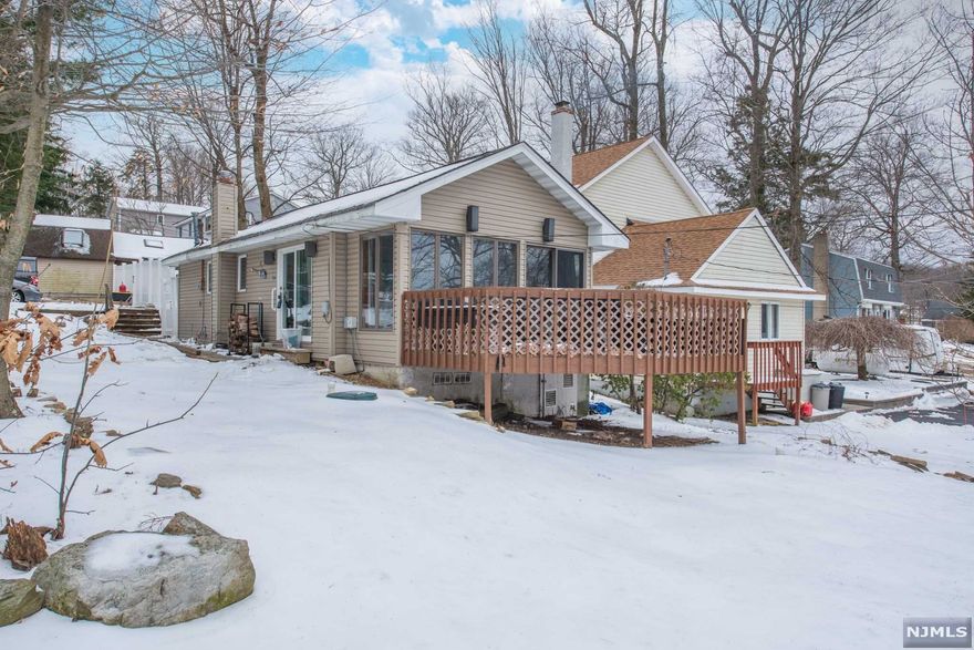 Welcome to this 2 Bedroom, 1 Bath Lake Style Ranch In Upper Greenwood Lake Community. Located only a few Steps from the Water! Home Features Bright Open Layout, Kitchen, Dining Area, and Living Room with Beautiful Brick Fireplace and sliders to Large Deck with Lake Views All Around. UGL Offers Members Only Beach & Clubhouse, Dock Opportunity, Motor Boating, Kayaking, Swimming, Fishing, Jet Skiing & More! Plus Year Round Activities! Just 1 Hour To NYC & Close To Major Highways, Shopping, Dining, Golf Courses, Ski Resorts, Wineries, Apple Orchards, Drive-In Theater & So Much More!