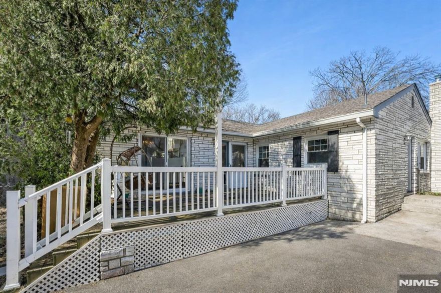 Opportunity in desirable Rutherford! This 3-bedroom, 2-bath ranch offers excellent potential for buyers looking to renovate or customize a home to their taste. The home sits set back from the street, offering added privacy, and features a long driveway providing ample off-street parking. Inside, the property offers a functional single-level layout with a partially finished basement that provides additional flexible space and storage. The yard configuration is unique, with the primary outdoor space located in the front of the home rather than a traditional backyard. Ideally situated approximately 1 mile from the Rutherford train station and close to major highways, making commuting convenient. With the right vision and updates, this property presents a strong opportunity to create value in a sought-after Bergen County location.