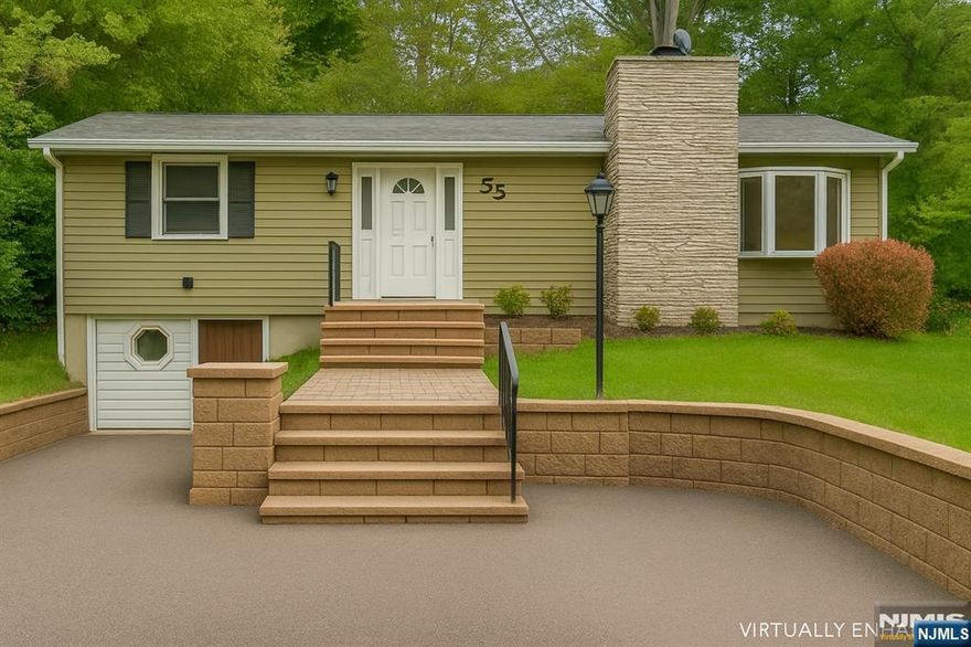 Welcome to 55 Orchard Drive! Nestled in the sought-after Pleasant Valley Lake community, this fully renovated raised ranch features 3 bedrooms and 1.5 baths. The inviting living room offers a fireplace and large windows, while the renovated eat-in kitchen includes sliders opening to a beautiful backyard, along with newly updated appliances and stylish finishes. The lower level features a large open space perfect for a family room, plus a new storage room, laundry room, half bath, and bedroom/bonus or office space, all newly carpeted with a walkout to the garage. A new septic system is currently being installed. Enjoy modern comfort and versatile living in this charming lake community â€” move right in and make it your own!