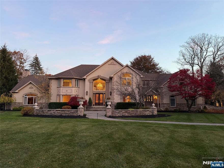 Welcome to Antlers Ridge Estates! Where luxury, design and lifestyle converge. Experience the art of living in this custom-built masterpiece, crafted with precision and passion. Every inch of this home has been curated with an unwavering attention to detail, a timeless floor plan reimagined with elevated finishes and endless possibilities for any style of living. Step outside and prepare to be amazed. Your private resort awaits - three levels of bluestone patios and terraces designed for seamless entertaining. A heated pool with cascading waterfall, jacuzzi spa, firepit, outdoor kitchen and BBQ area all surrounded by lush, professionally landscaped grounds on over five pristine acres, complete with a state-of-the-art lighting and sound system. This isn't just a home - it's a lifestyle statement. Perfectly positioned close to downtown, top-rated schools, and commuter routes, this property delivers the ultimate blend of privacy and convenience. Luxury, Location, Lifestyle - You've arrived and welcome home to Antler Ridge Estates.