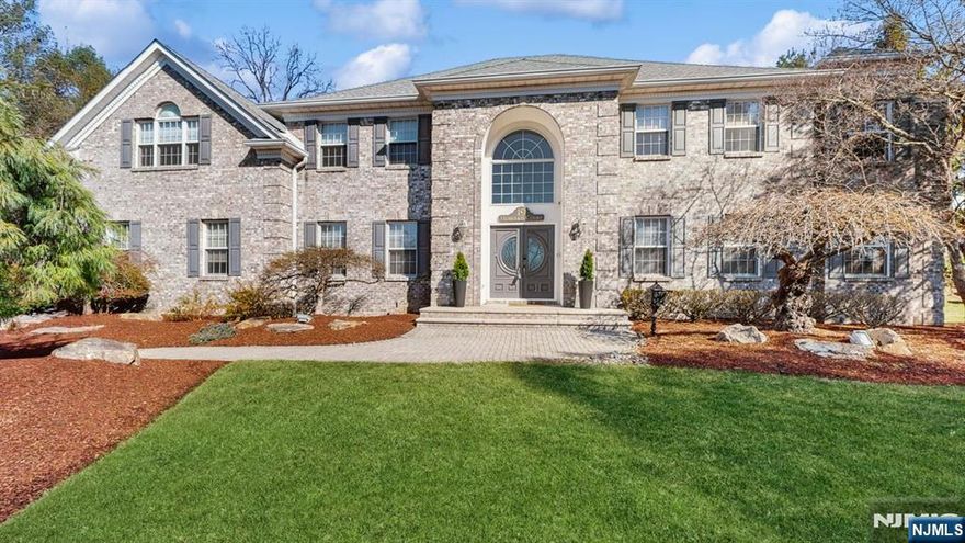 This all-brick center hall Colonial is set back on .63 acres of landscaped property on a well-sought-after cul-de sac of Allendale, providing a private backyard setting. The expansive living spaces and well-designed floor plan allow for comfortable and versatile living. The first floor boasts a 2-story entry foyer, grand dining room, a sunken family room with a gas fireplace, double doors to the back patio overlooking a professionally landscaped backyard, and a colossal office/library with custom-built-in cabinetry. Beautiful gourmet kitchen with granite counters, stainless appliances, enormous center island with tons of cabinets, butler station off the kitchen breakfast area, hallway powder room, laundry, mud room, and access to a 3-car garage. The second floor offers an expansive main bedroom suite w/sitting area, his & her walk-in closets, master bath w/tub shower, and a skylight, four additional spacious bedrooms, two full baths and humongous room/closet complete this level--Fully finished basement w/rec rm, theater, custom oak wet bar, built-in wine cooler, & storage room. Massive renovations done.