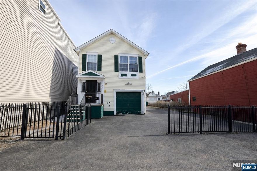 Turn-key detached two-family home set on a large lot in Newark, offering an excellent opportunity for both investors and owner-occupants. The first unit has been recently refreshed and is move-in ready, featuring three generously sized bedrooms, a spacious living area, a brand-new kitchen with stainless steel appliances, fresh paint and carpeting, and an updated bathroom. The second unit is tenant-occupied and well-maintained, offering two well-proportioned bedrooms along with a comfortable living room, dining area, and kitchen. Additional highlights include direct garage access, on-site laundry, and abundant storage space. A solid, income-producing property with strong upside potential.